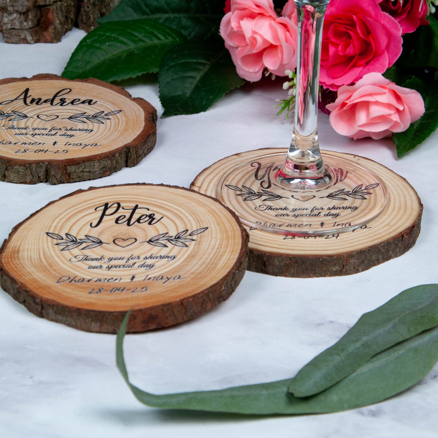 Wooden coasters personalised with guest names