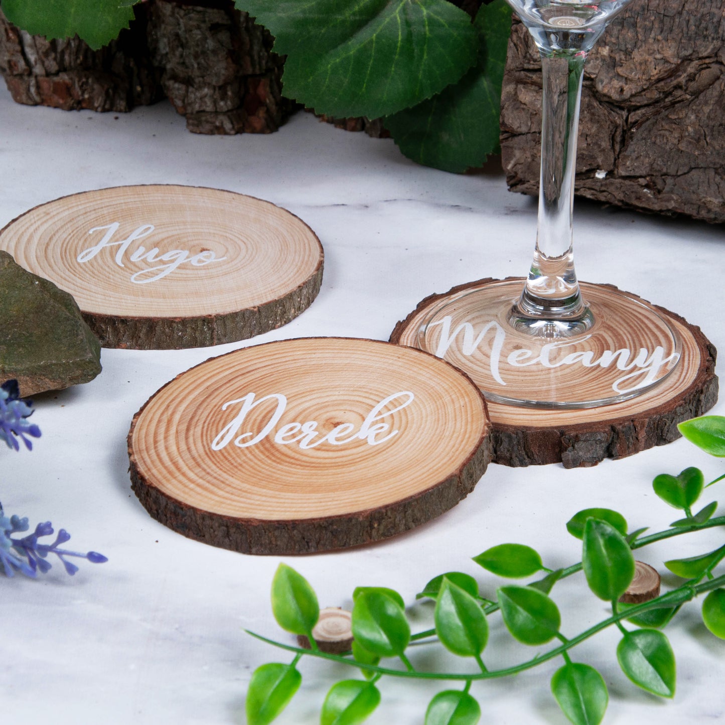 White print on wood slice coasters for unique wedding favours