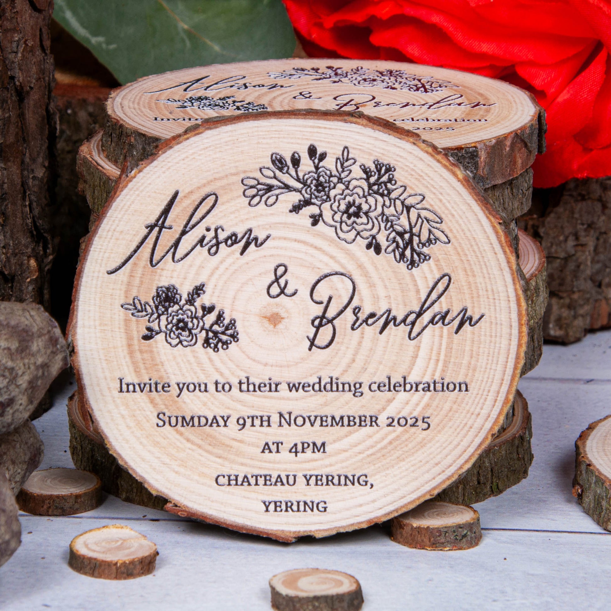 Black and white floral print on wood slice personalised as an invite