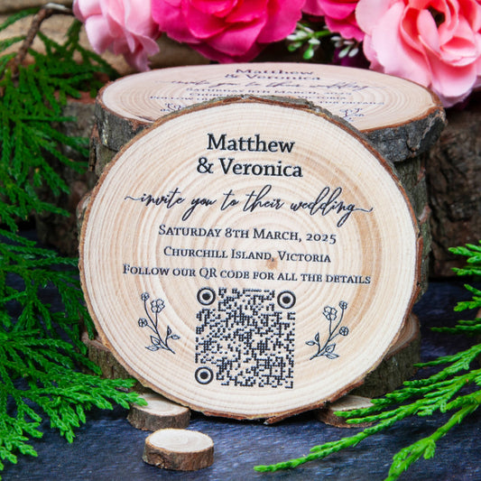 Wood slice wedding invite with personalised QR code to link to website