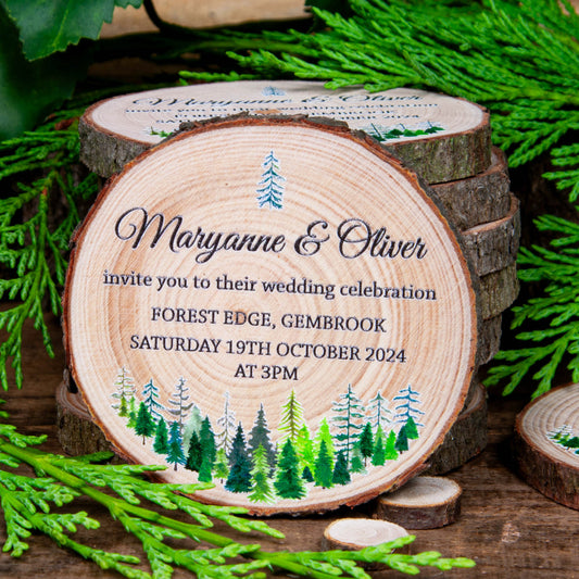 Rustic wood slice wedding invitation with Tiaga forest design