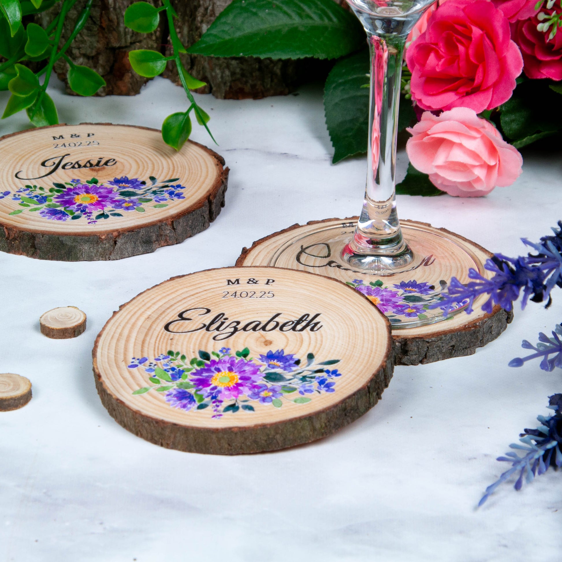 Floral wedding favour coasters made from tree slices