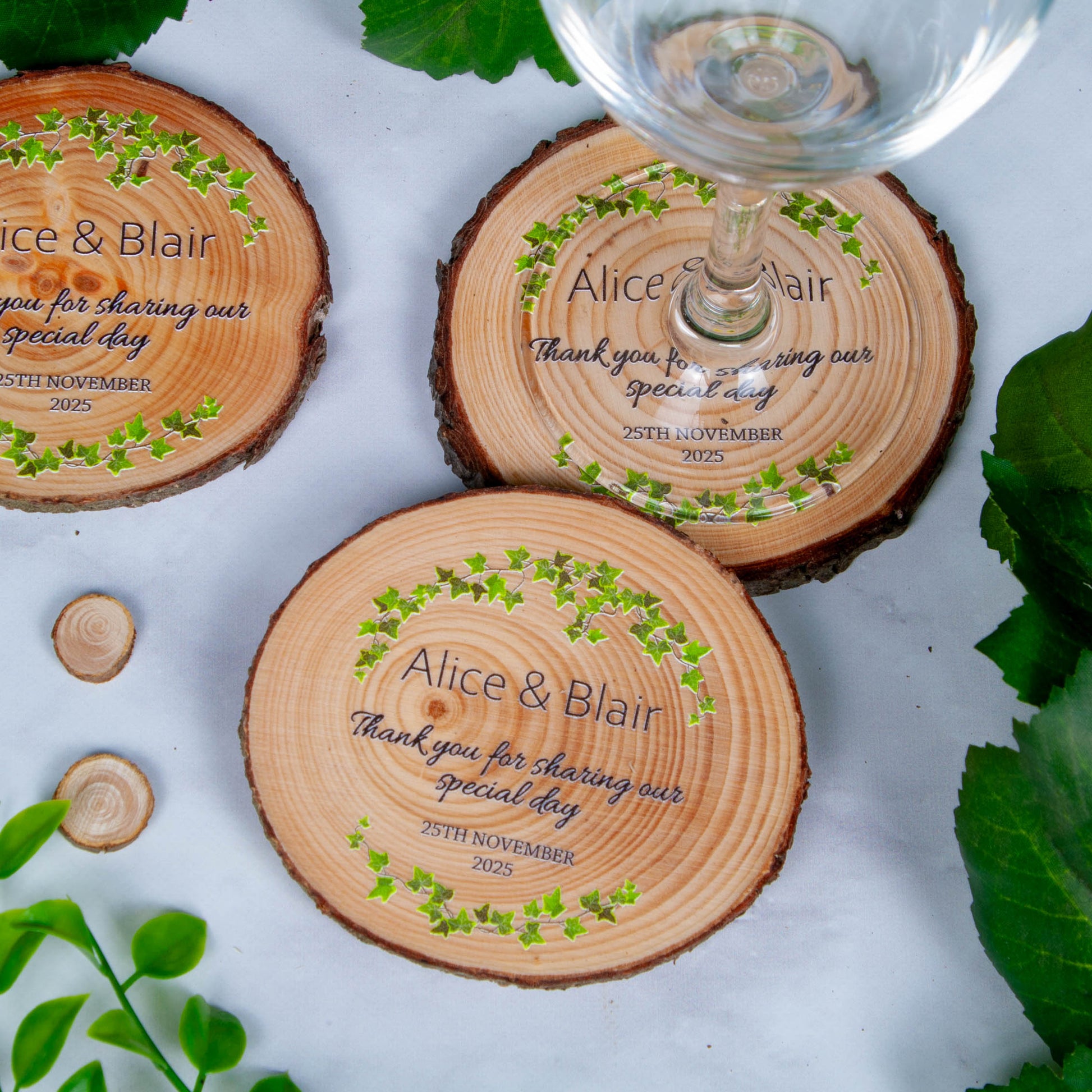 Rustic wood slice coaster for wedding favours with ivy design